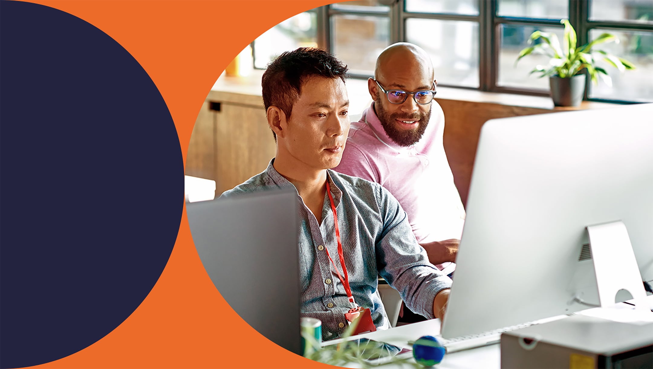 coworkers working together on computer