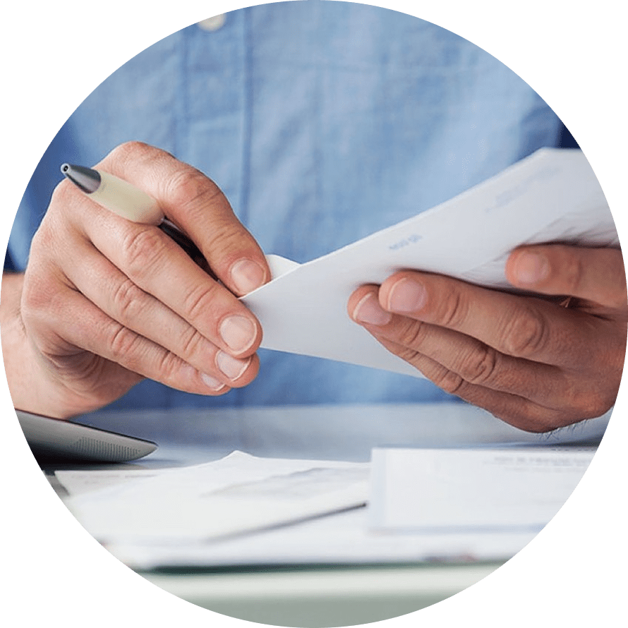 person opening envelope