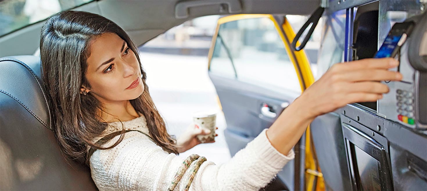 person paying for cab fare